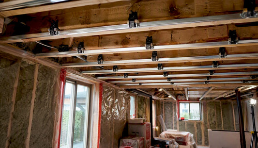 Basement ceiling with sound isolation clips installation