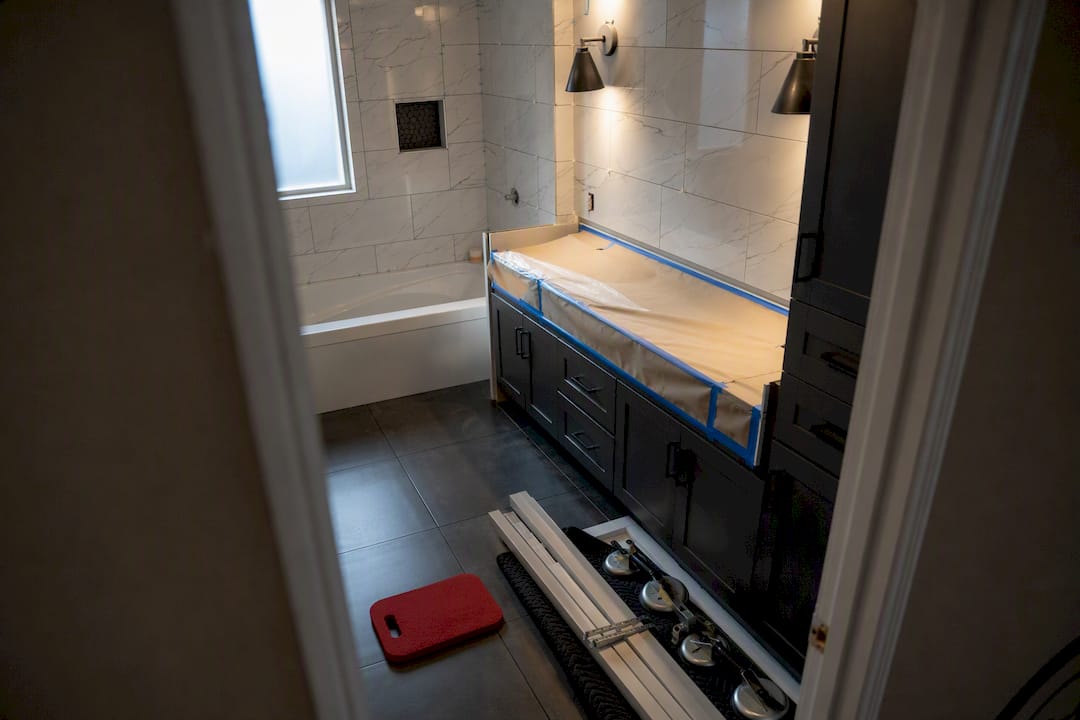 Partially renovated bathroom during coordinated construction